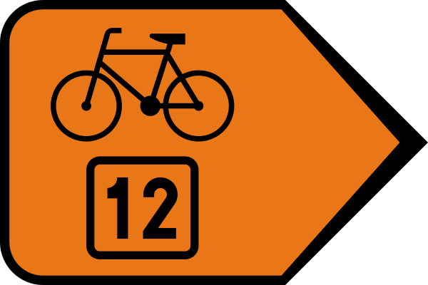 R-4b 200x300 typ 1 Zmiana kierunku szlaku rowerowego pionowy znak informacyjny z wyraźną strzałką kierunkową.