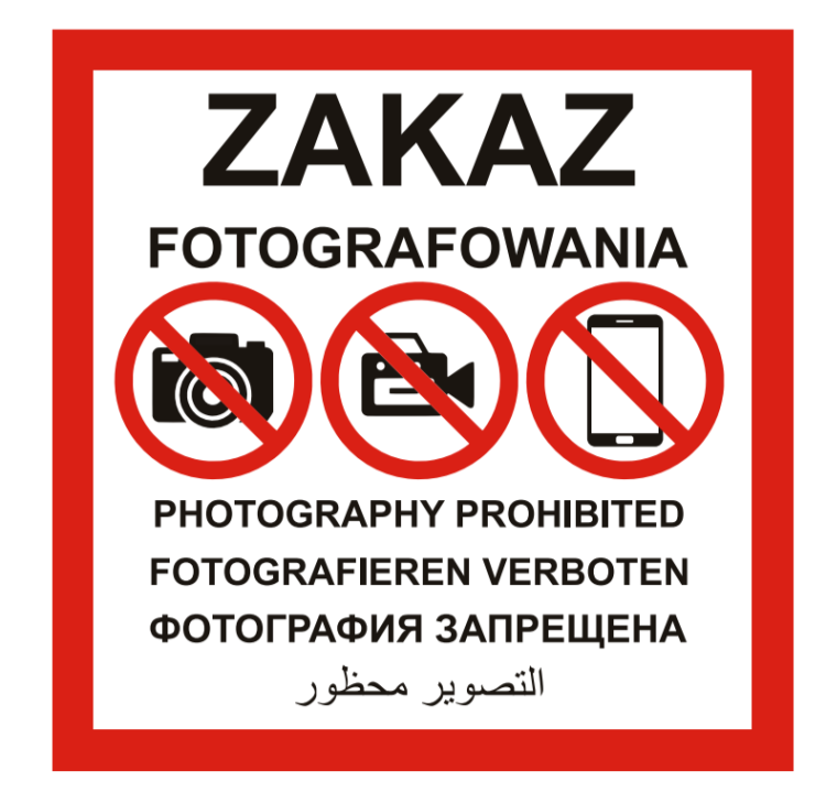 Tabliczka zakaz fotografowania czytelny znak informacyjny do wygradzania stref objętych ochroną wizerunku lub tajemnicą przedsiębiorstwa.